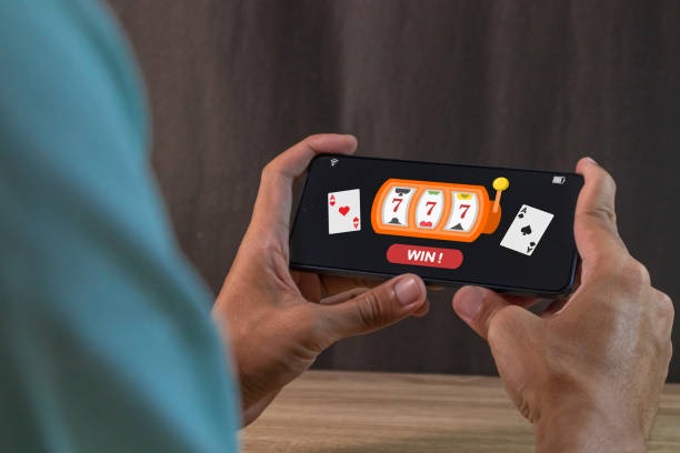 jandaslot mobile app interface showing sportsbook, live casino, and slot games on Android and iOS